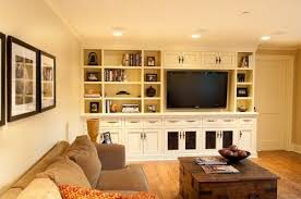 Off Center Space For Tv Doors With Speaker Fabric In Them Cabinets And Open Storage Nice Combo Home Family Room Media Room Design