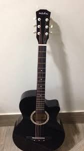 The first guitar straps featured a clothesline variant tied to the necks of a heavy bass and an electric guitar. Beatles Centre Olive Tree R38c Cutway Acoustic Guitar With Truss Rod Black Glossy Finish