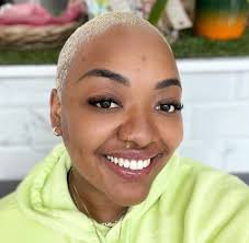 Woman's prosthetic leg 'edited out' for beach body positivity poster