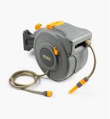 Included are two garden stakes to secure the unit into the ground and a discharge tube and leader hose. Hozelock Auto Retracting Hose Reels Lee Valley Tools