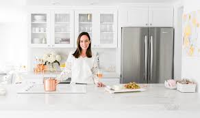 For a refreshing and certainly unique backsplash, consider a floral tile. White Marble Kitchen Design Remodeling Decorating