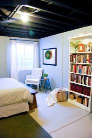 We did not find results for: Painted Ceiling Concrete Walls And Floors How To Make A Cozy Guest Bedroom Space In Your Unf Basement Guest Rooms Basement Master Bedroom Unfinished Basement