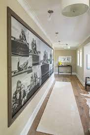 10 Stylish And Creative Ways To Display Family Photos Family Photo Wall Murals Your Way Hallway Pictures