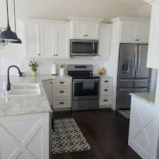 White Kitchen Subway Tile Wood Floors Farmhouse Fixer Upper Target Rugs Farmhouse Style Kitchen Cabinets Kitchen Cabinet Styles Farmhouse Style Kitchen