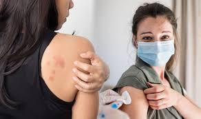 Symptoms include hives, itching, trouble breathing, and tightness of the throat. Covid Vaccines Allergic Reaction Side Effects Include Hives And Swelling Of Face Express Co Uk