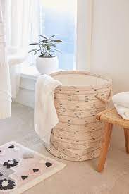 20 Dorm Room Decor Essentials That Ll Liven Up Your Tiny Space Decor Essentials Minimalist Decor Laundry Room Decor