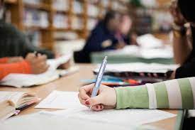 student stressed over research essay writing