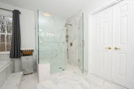 Shiny with no need for wax or polishing agents. Modern Master Bathroom Remodel Marble Look Design