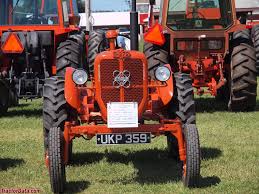 Image result for Orange Red 1972 Tractor