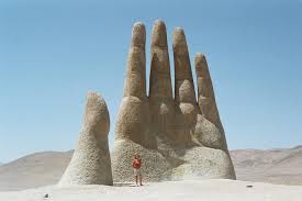 The Hand Atacama Chile Inagugerated In The 1990 S It Has Become A Point Of Interest For Tourists Travelli Deserts Of The World Sculpture Interesting Things