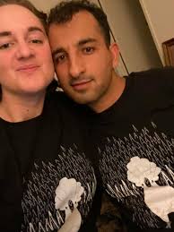 Brother and I at family reunion dinner, had to show our in the Miku shirts