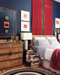 In The Master Bedroom A Vintage Indian Tapestry From Vajra Tibet Hangs Above A Bed Dressed In Linens By Signoria An Eclectic Bedroom Blue Interior Design Home
