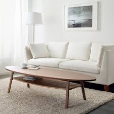 Nova is a simply designed contemporary occasional chair with a comfortable upholstered seat and backrest on a sled wood base. Stockholm Coffee Table Walnut Veneer 70 7 8x23 1 4 Ikea