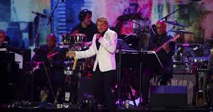 Barry Manilow performing on stage during a concert