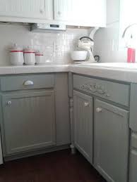 Remodelaholic Painting Oak Cabinets White And Gray Kitchen Cabinets Painted Grey White Kitchen Makeover Painting Oak Cabinets