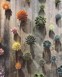 This grouping is comprised of one fourteen inch flower, four eight inch flowers and a seven inch ginkgo leaf. Ceramic And Glass Succulents And Vases By Chive Inc Via Top Drawer Ss18 Succulent Wall Ceramic Succulent Succulents