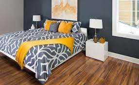 Living design ideas with brown floor and wood walls. How To Match Wall Color With Your Wood Floor Empire Today