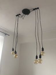 8 light edison bulb led multi light pendant black spider chandelier for living room restaurant. Edinburgh Artist S Fancy Lighting Fail Goes Viral After He Shares Snap Of Electrician S Botched Fitting Job