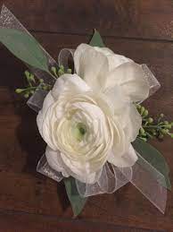 White Ranunculus And Seeded Eucalyptus Wrist Corsage Ranunculus White Ranunculus White Flower Boutonniere Wrist Corsage