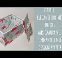 111. Video/ 111. Video/ Stabile, elegante Box mit Deckel aus Graupappe  ummantelt mit Designerpapier