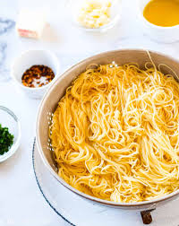 Drain pasta well and mix with garlic mixture; Garlic Angel Hair Pasta Recipe Video Mae S Menu