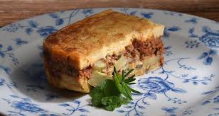 Moussaka With Artichokes By Greek Chef Akis Petretzikis Artichokes Are A Lovely Addition To This Traditional G Vegetable Dishes Recipes Moussaka Greek Recipes