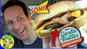 It S Garlic Butter Goodness Done The Sonic Way With The Introduction Of Their New Garlic Butter Bacon Burger Promoted As A Diner Bacon Burger Burger Bacon