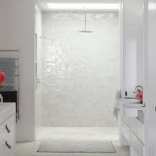 Find professional tips on designing for small spaces and picking tile colors. Iridescent Tile Shower Design Ideas
