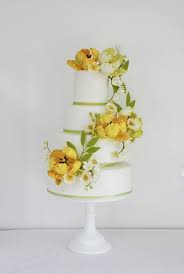 Tiered Wedding Cake With Yellow Sugar Flowers Sugar Parrot Tulips Sugar Freesias Vic Wedding Cake Yellow Flowers Wedding Cake Fresh Flowers Yellow Wedding Cake