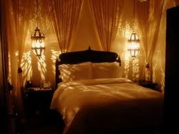 For our third and final installment on how color can be used to create the perfect ambience in a bedroom, we're focusing on how to create a romantic vibe. Love How The Chandeliers Create Ambiance Are In The Center Of Curtains Elegant Bedroom Decor Elegant Bedroom Romantic Bedroom Lighting