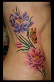 Butterflies And Flowers Tattoos Mike Godfrey Tattoo Lotus Flower Butterfly Color Vines Reali Purple Rose Tattoos Flower Tattoo Designs Realistic Lotus Tattoo