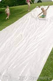 ~get kids {or adults} ready for the slip and slide with their white shirts and goggles. 320 Sycamore Diy How To Make A Slip N Slide Slip N Slide Homemade Slip N Slide Diy Slip N Slide