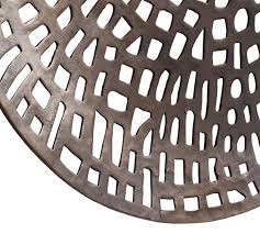 This item displays in three segments. Indoor Outdoor Bronze Disc Wall Art Pottery Barn