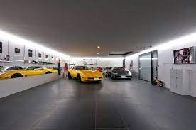 Bespoke timber frame garages and car ports designed and built to your requirements by our expert team based in suffolk. Kre House In Tokyo Has A 9 Car Garage With An Awesome Hidden Surprise Garage Design Interior Luxurious Garage Garage Design