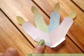 Then open up the middle insert and push these rectangles forward and fold them down gently to create the birthday cake on the side of the card. How To Make A Birthday Cake Pop Up Card Robert Sabuda Method