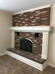 Updated Brick Fireplace With New Surround Trim Around Hearth And Ceiling Crown Molding Fireplace Trim Fireplaces Layout Painted Brick Fireplaces