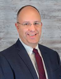 Brice W. Feldt, COO & Senior Vice President