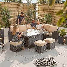 We're rattan fans year around. Cambridge Right Hand Casual Dining Set With Firepit Table