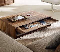There is something to be said for those individuals who can take something and transform it into an art piece. 17 The Most Coolest Coffee Table Designs Ever Wood Coffee Table Design Coffee Table Wood Furniture Design Wooden