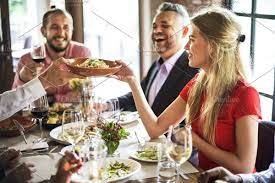 Dinner usually refers to what is in many western cultures the largest and most formal meal of the day, which some westerners eat in the evening. Friends Having Dinner Party Dinner Party Holiday Recipes Vegan Breakfast Options