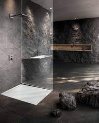 The plush green and blue rug adds color and texture. 33 Best Concrete Bathroom Ideas Concrete Bathroom Bathroom Design Bathroom Inspiration