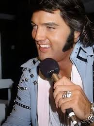 That was Elvis. Larger than life, yet quietly vulnerable. A man who made  the world fall in love with his voice, but who searched endlessly for a  kind touch and a soft