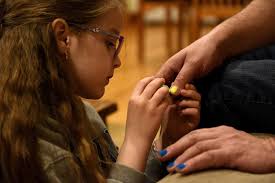 1: Dzhesika Uladovska spends time with her daughter Kirianna, 8, while  making dinner at their sponsor's home in North Thetford, Vt.,