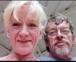 Can someone please remove the woman? I want it just me and my dad, I don't  have very many pictures with him in it he passed when I was young.