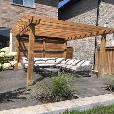 This plain deck is not worthy of its pretty stone house. Pergolas Gallery Decomax Ltd