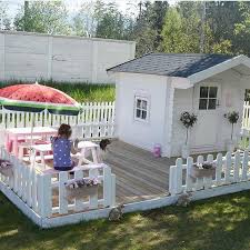A kids wooden playhouse may be the toy your kid need to fuel their imagination and help them enjoy warm sunny days. Here S A Bunch Of Adorable Outdoor Playhouse Ideas For Kids That Will Create A Whole New Wonderful For Your Little One Right Play Houses Backyard Play Backyard