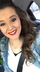 Mary Haley, science teacher at Park Hill High School, was among those  chosen to carry the Olympic torch through the KC area