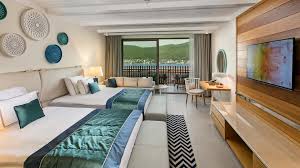 Bodrum'un girişinde, bin 298 yataklı ve 556 odalı, güvercinlik enternasyonal otelcilik tarafından devam edilen titanic otel inşaatı, koyun en güzel noktasında yükseliyor. Titanic Deluxe Bodrum Guvercinlik Otel Konaklama Imkanlari