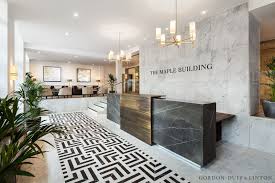 Reception Area Of The Maple Building Bespoke Carrara And Grey Marquina Marble Floor Tiles Bespoke G Reception Desk Design Clinic Interior Design Lobby Design