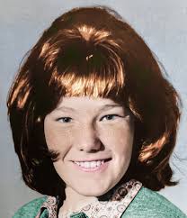 I'm so indecisive about her hair. Dark, then light, then dark again.